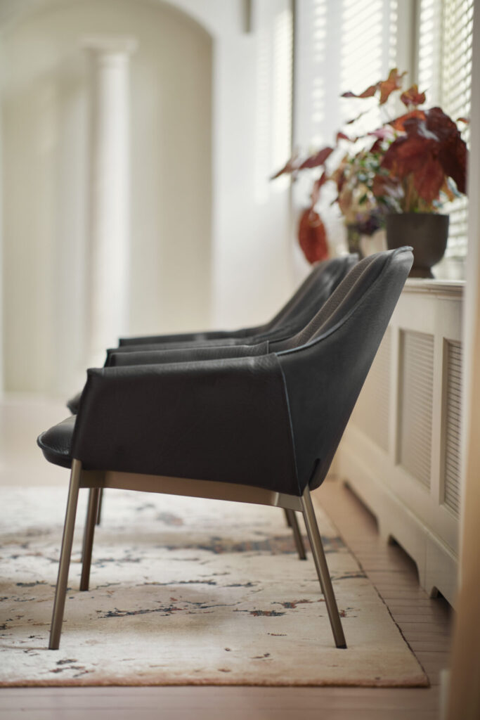 Freifrau Grace lounge chair with low back in black leather